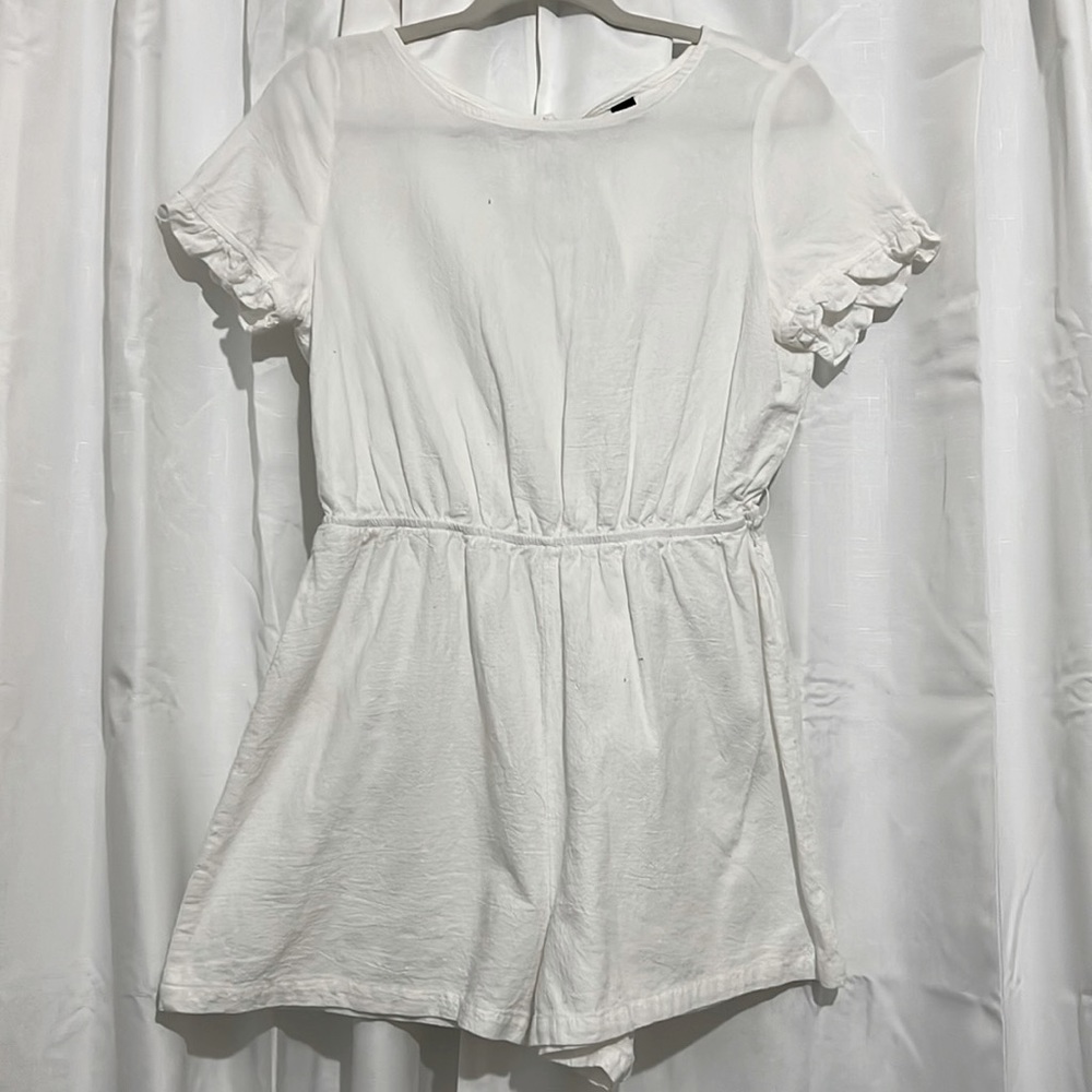 White romper with ruffle sleeves